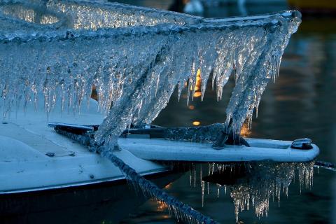 Ice accretion due to freezing sea spray